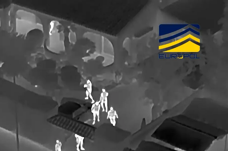 Image depicting Europol agents seizing assets during the operation against the crypto-hawala network.